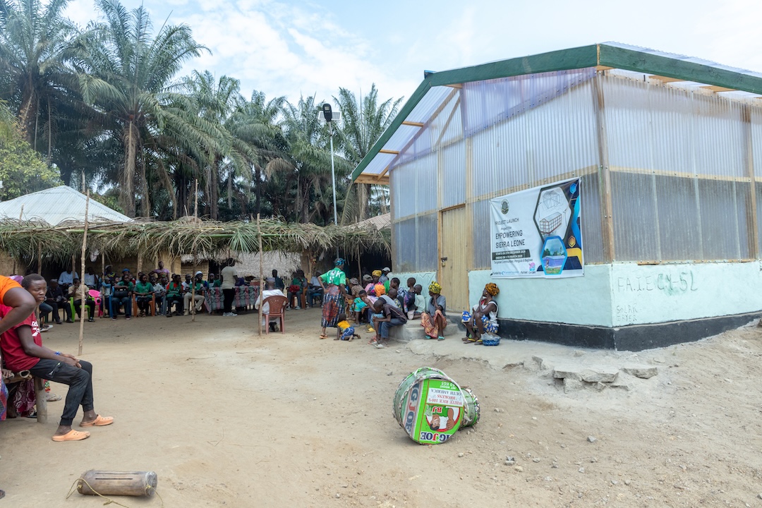 People sitting outside a building