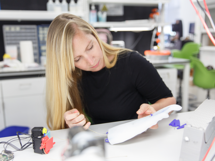 Megan Leftwich studying a sea lion flipper