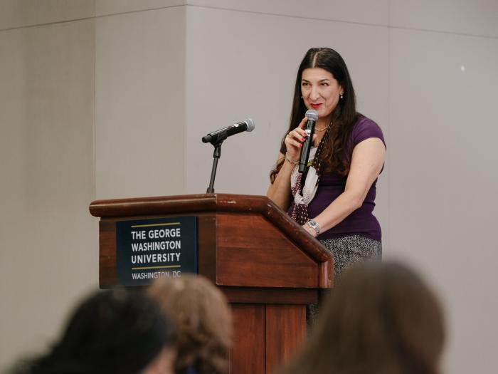 Lorena Barba speaking at a podium