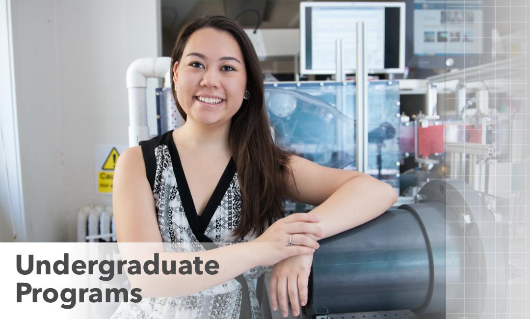 Undergraduate Programs; female student posing in lab